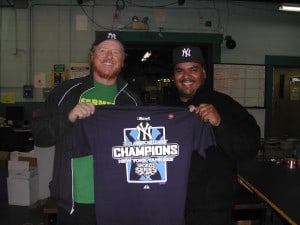Two happy screenprinters (and Yankee fans), tired but happy after printing Yankee ALCS shirts all night