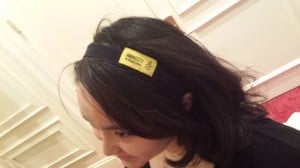 Bottom Strip of Shirt had a Logo Label, cut and tied it became a headband