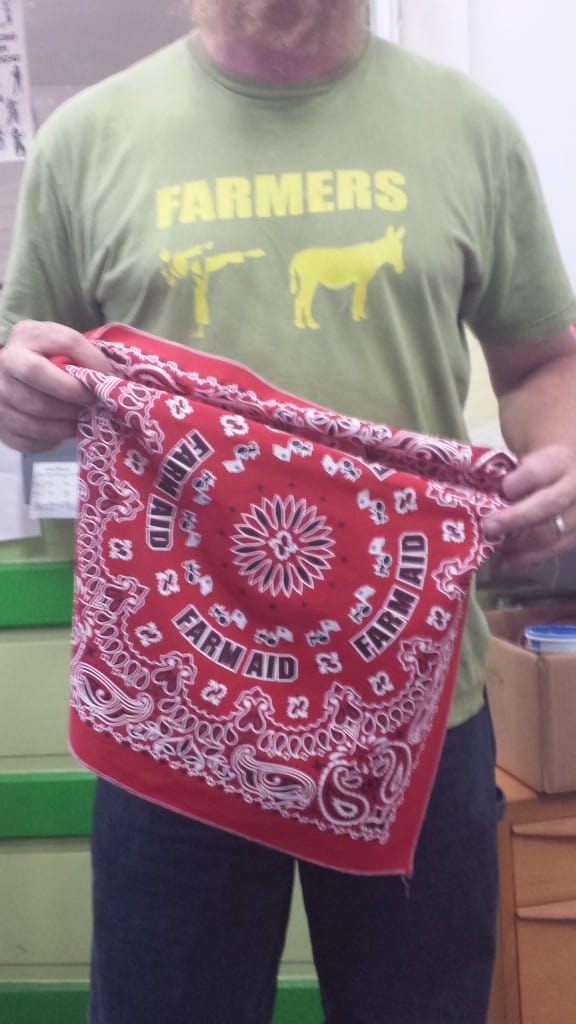 Farmers Kick Ass and so does Willie and his red bandannas. Farm Aid 2014 Raleigh here we come.