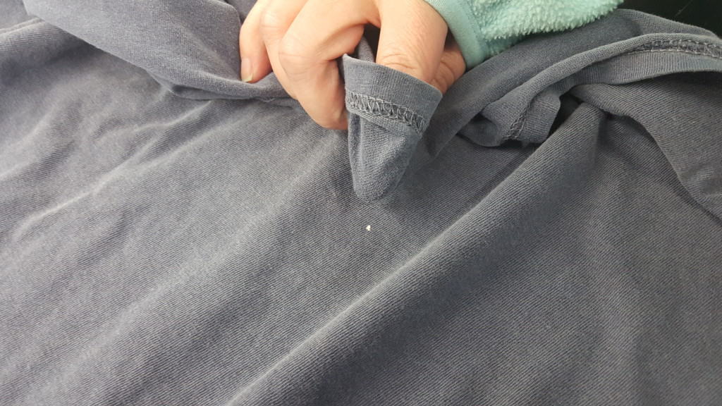 Even more rarely you can cover a tiny spot by rubbing the inside of the shirt on it