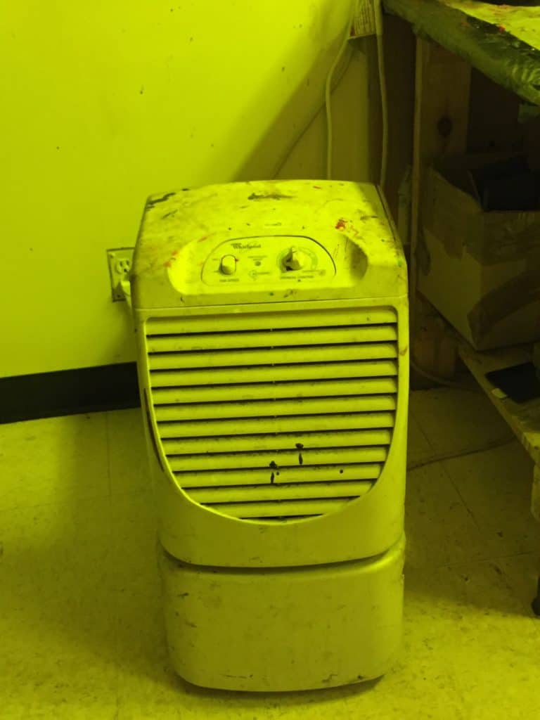 Second line of defense in keeping your humidity down is a duh, dehumidifier. Get one or even two in a big screen room. They remove moisture but do not lower the temperature of the room.